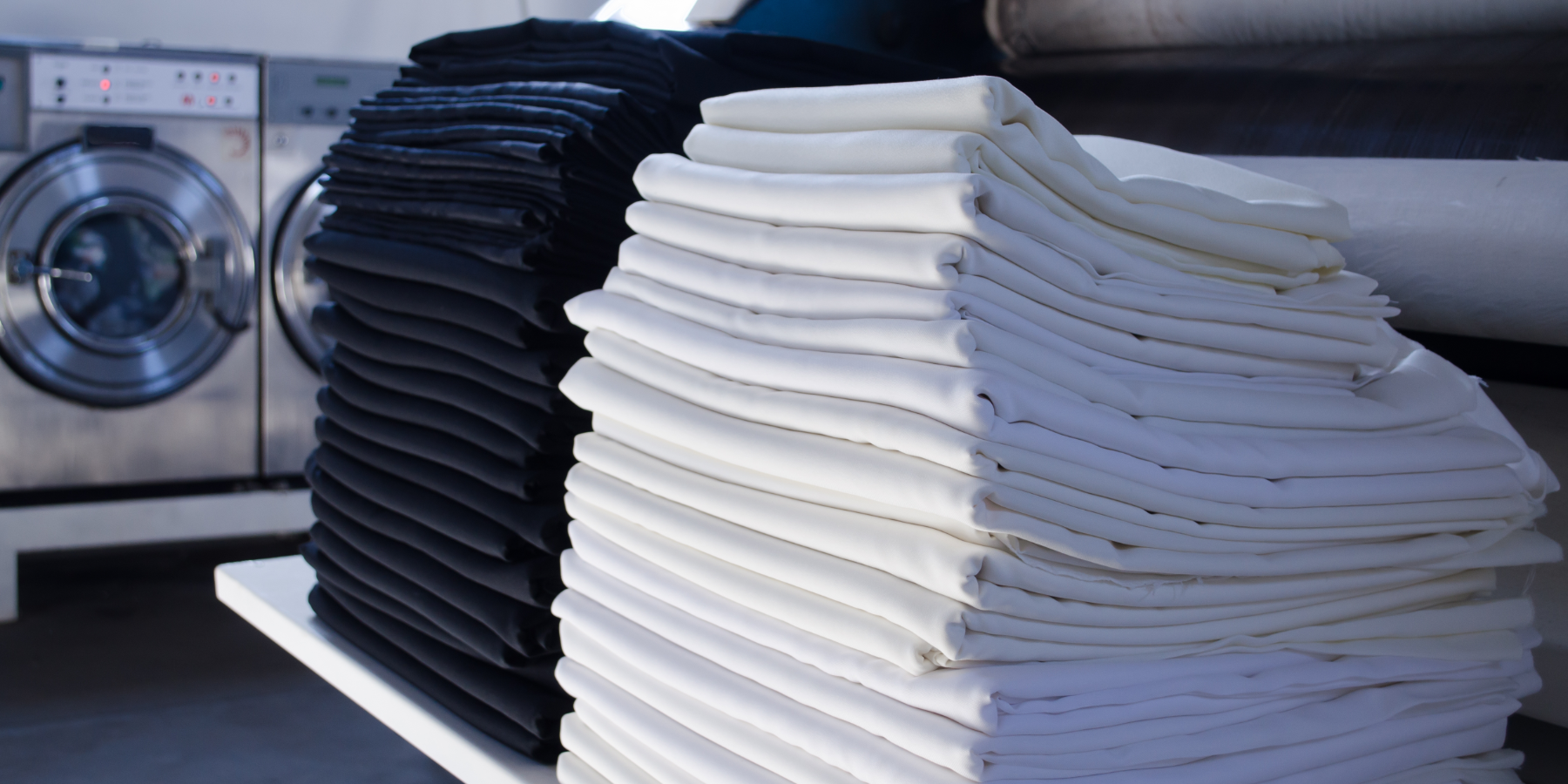 Commercial Laundry Stacked Black And White Linens 1800X900